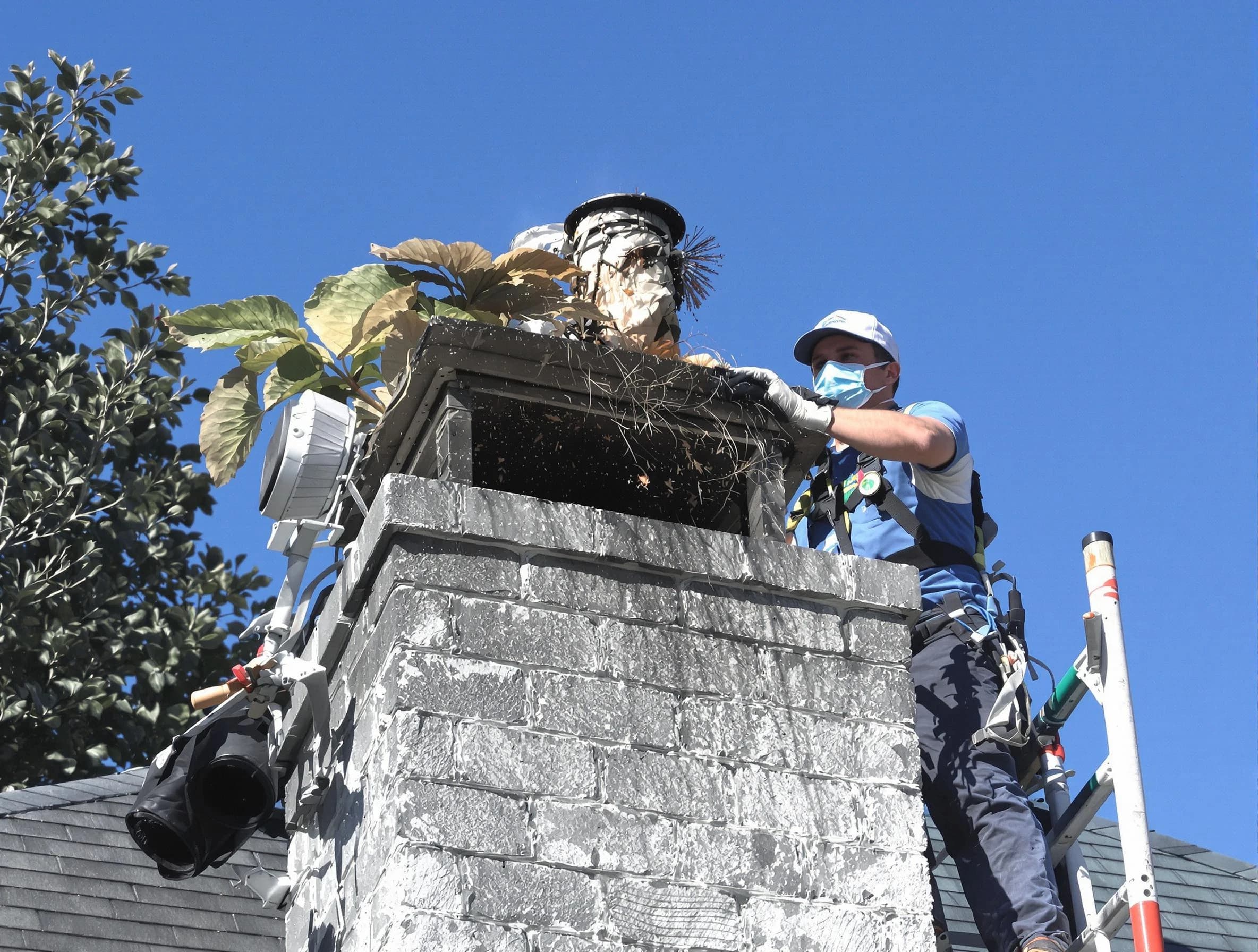 Westfield Chimney Sweep specialist performing chimney cleaning in Westfield, NJ